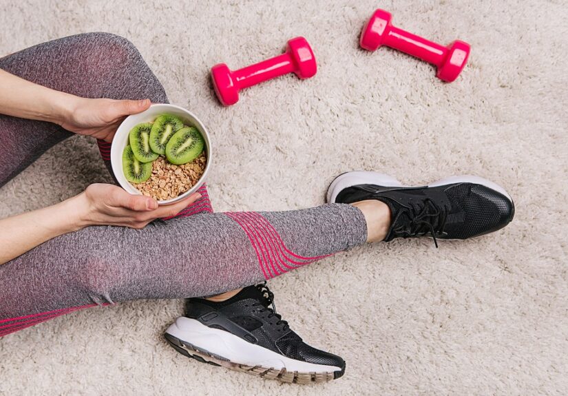 girl sporting elk plate muesli kiwi fitness workout dumbbells